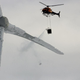 A photo of an Alpine Helicopter test on a wind farm in the winter of 2013-2014 in the Uljabuouda mountains in Arjeplog, Sweden that has been recirculated recently as part of anti-climate propaganda.